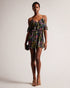 PRIYAHH-Trousers-Need an outfit to match your sunny disposition? Look no further than PRIYAHH. With ruffled off-shoulder sleeves and a flattering V-neck, this romper is perfect for any occasion from weekend brunch to a beach day. Plus, adjustable straps ensure a comfortable fit.The fabric of this product is made with 55% recycled polyester. Using recycled polyester helps divert plastic waste from ending in landfills, and helps us to reduce our dependence on virgin materials. Romper Off shoulder sleeves with